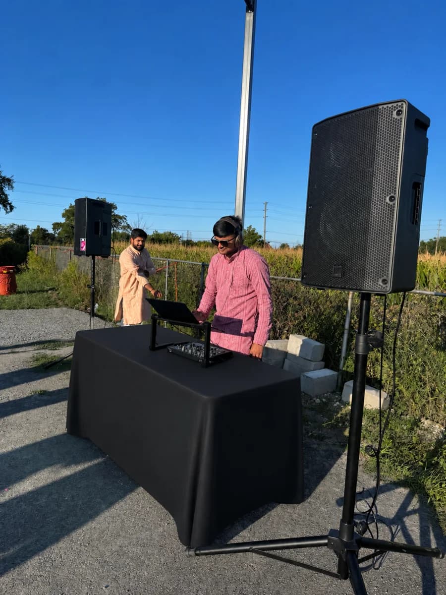 Outdoor DJ setup for a South Asian celebration